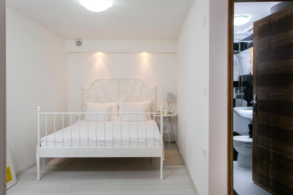 Postel nebo postele na pokoji v ubytování Apartments Heart of Dubrovnik