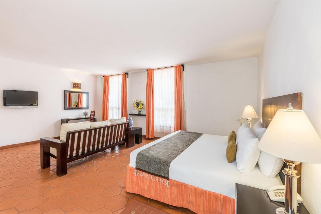 Postel nebo postele na pokoji v ubytování Hotel Casa Virreyes