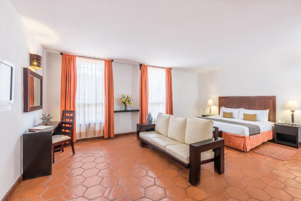 Postel nebo postele na pokoji v ubytování Hotel Casa Virreyes