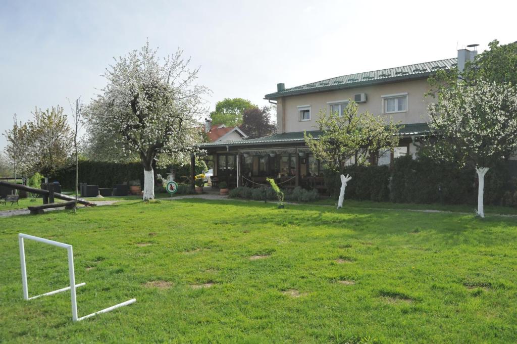 a yard with a soccer goal in the grass at Klet Cinkuš in Hrvatski Leskovac