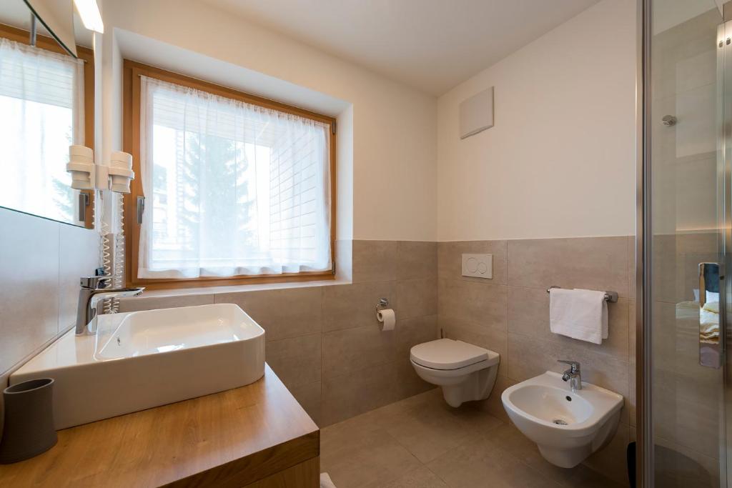 Kúpeľňa v ubytovaní Hotel Cavallino