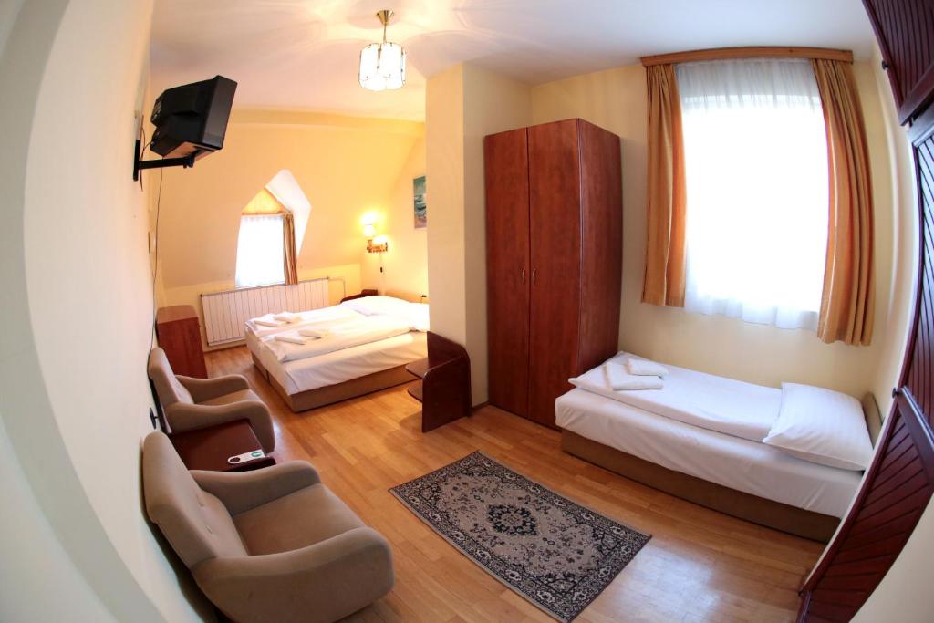 Postel nebo postele na pokoji v ubytování Hotel Bara Junior