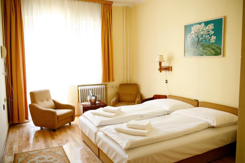 Postel nebo postele na pokoji v ubytování Hotel Bara Junior
