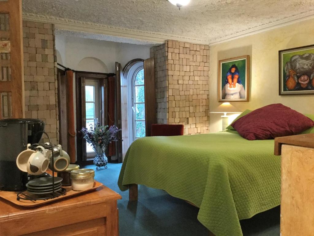Postel nebo postele na pokoji v ubytování Boutique Hotel Antinea