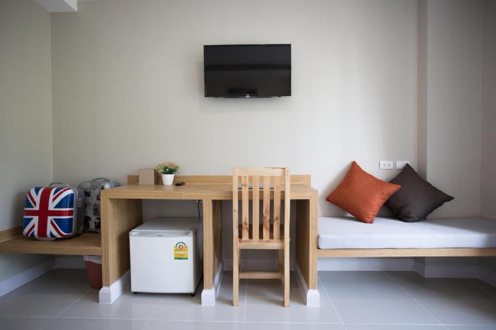 Postel nebo postele na pokoji v ubytování The Royal P Phuket - SHA Plus
