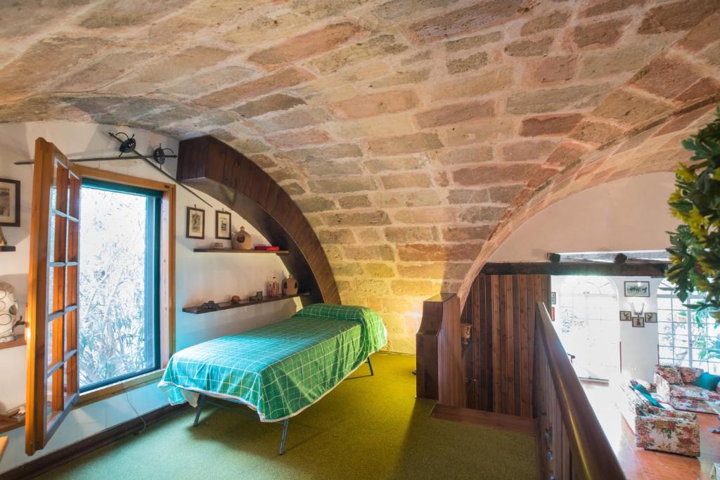A bed or beds in a room at Villino Oasi (Galatina)