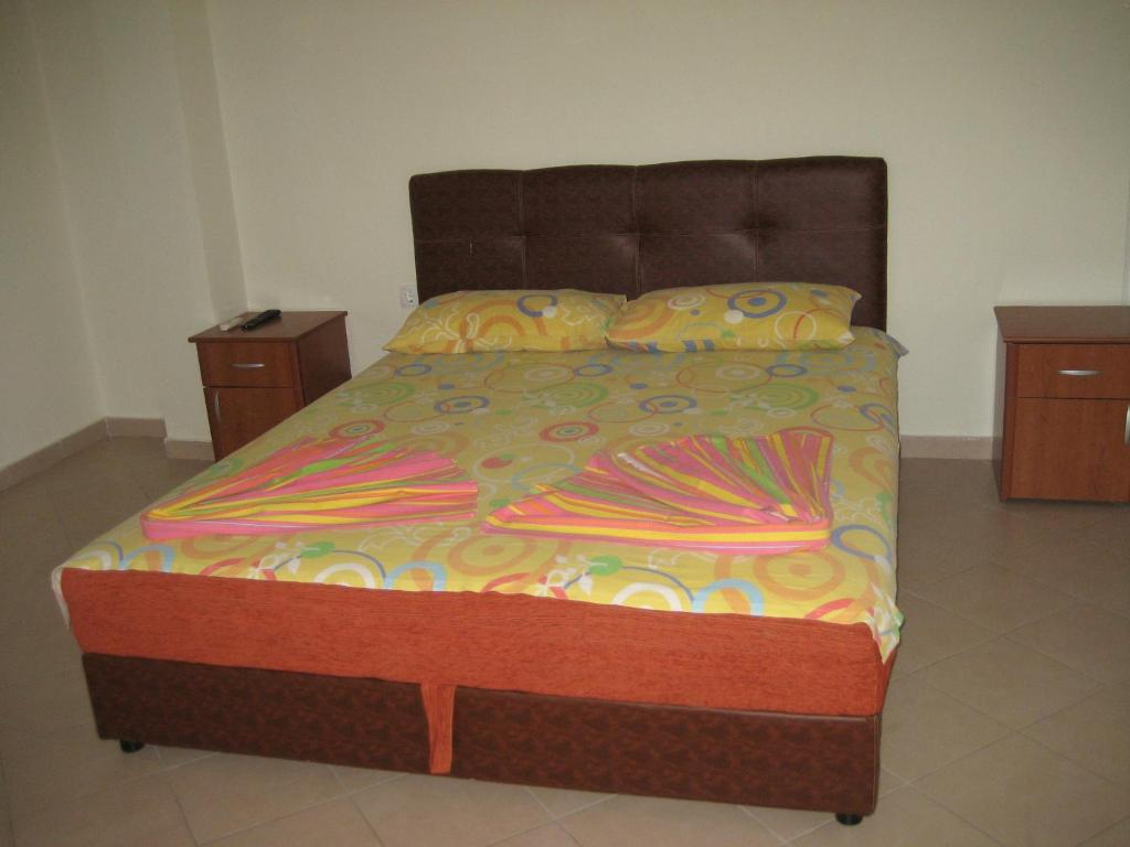 Postel nebo postele na pokoji v ubytování Guest House Vila Mimoza