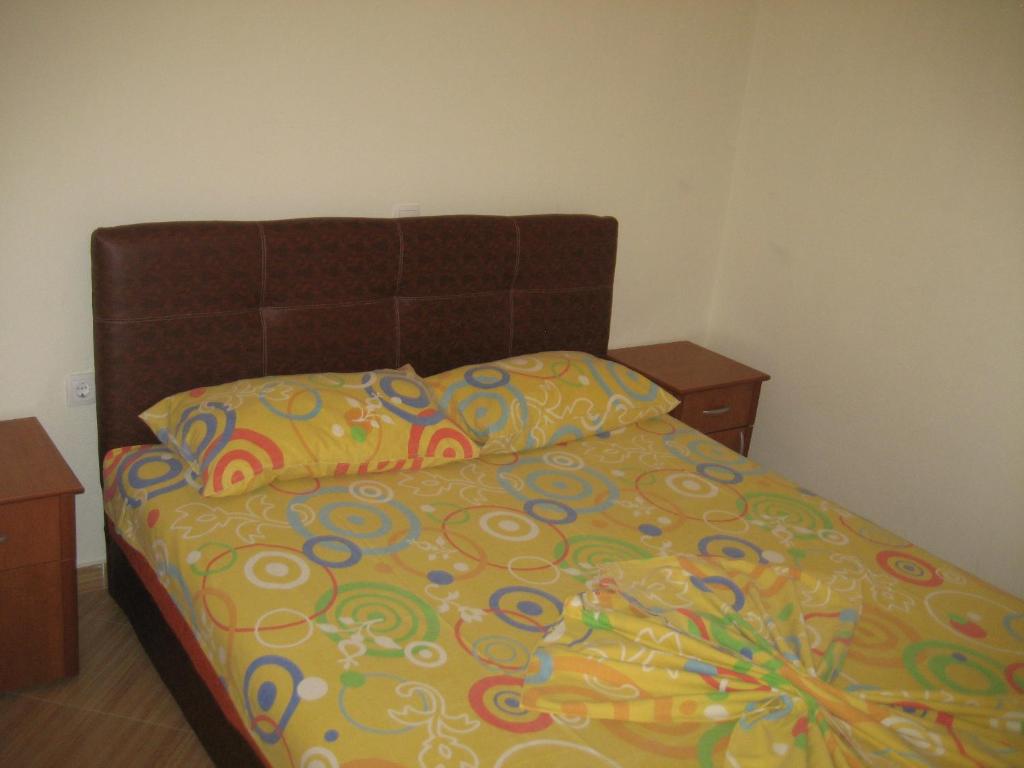 Postel nebo postele na pokoji v ubytování Guest House Vila Mimoza