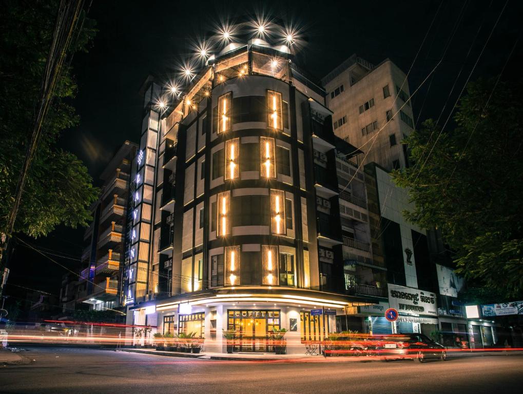 a building with lights on top of it at night at Lavanya Boutique Hotel in Phnom Penh