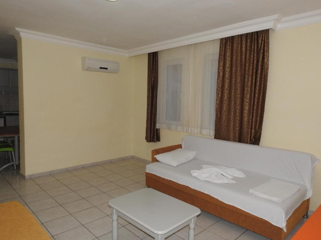 Postel nebo postele na pokoji v ubytování Sailor Apart Hotel