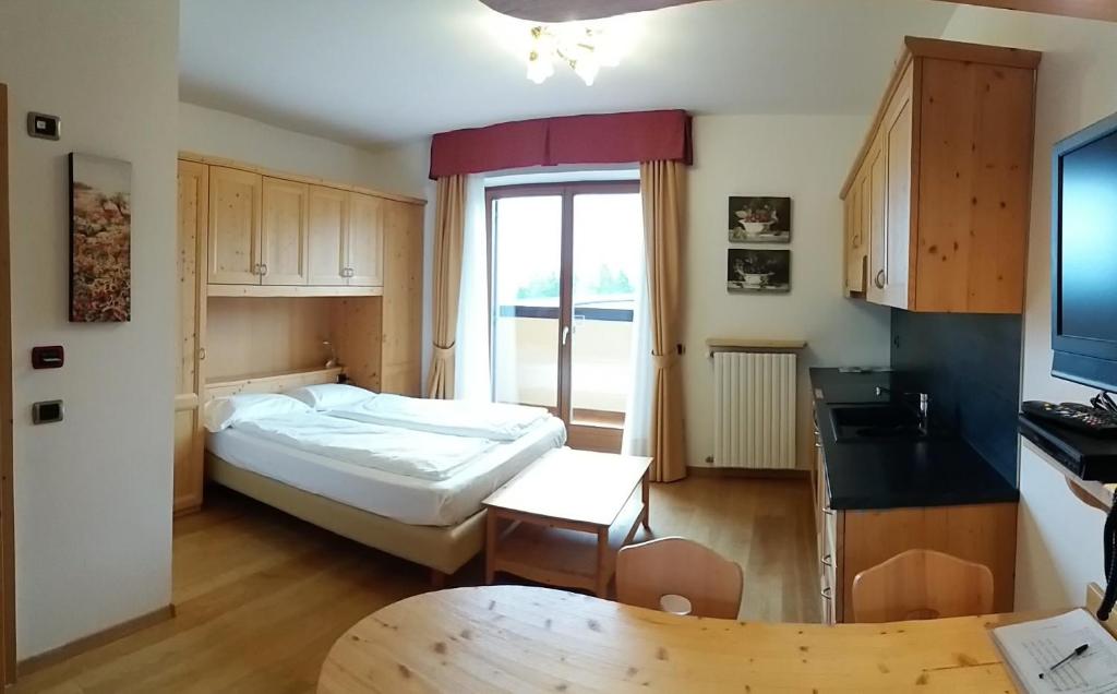 Postel nebo postele na pokoji v ubytování Residence Panorama