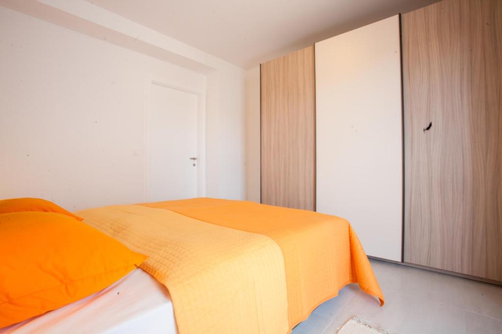 Postel nebo postele na pokoji v ubytování Vila Novak