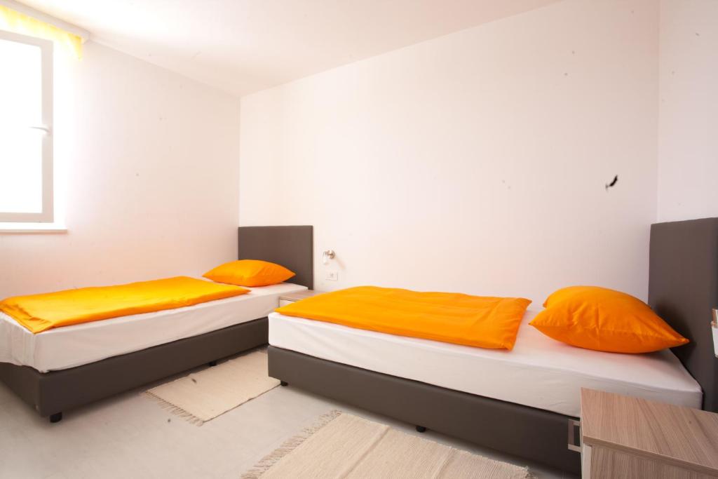 Postel nebo postele na pokoji v ubytování Vila Novak