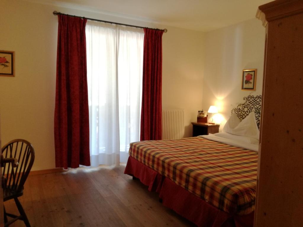 Postel nebo postele na pokoji v ubytování Hotel Ca' del Bosco