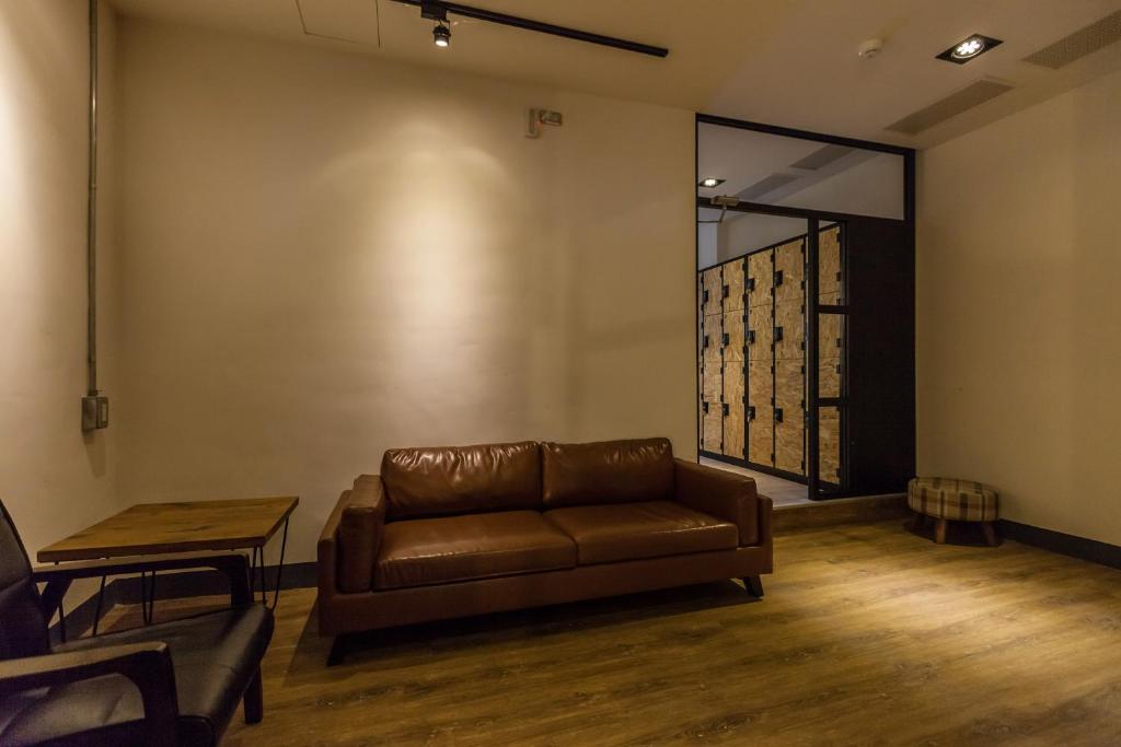 Posezení v ubytování Mini Voyage Hostel