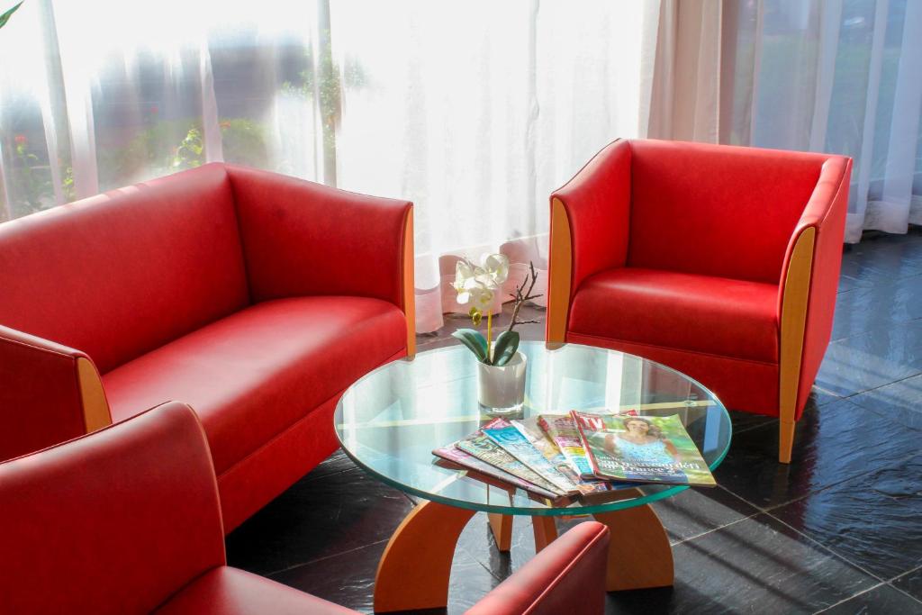 Posezení v ubytování Hotel Roc E Mare