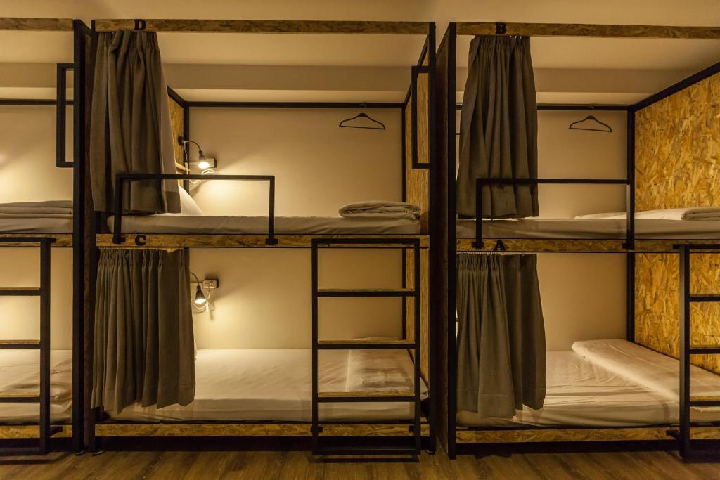 Postel nebo postele na pokoji v ubytování Mini Voyage Hostel