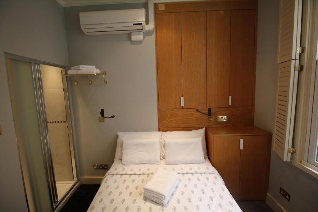 Postel nebo postele na pokoji v ubytování Fielding Hotel