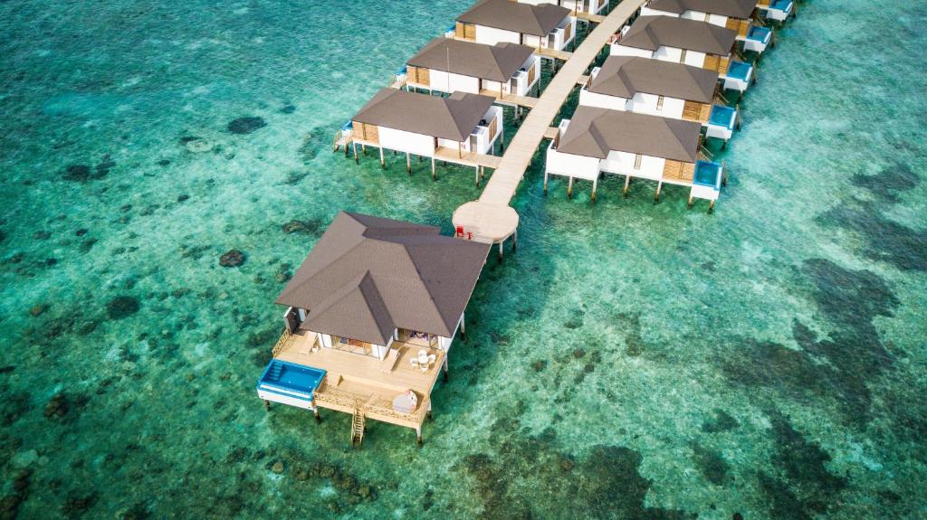 an aerial view of a resort in the water at ROBINSON NOONU - All Inclusive in Manadhoo