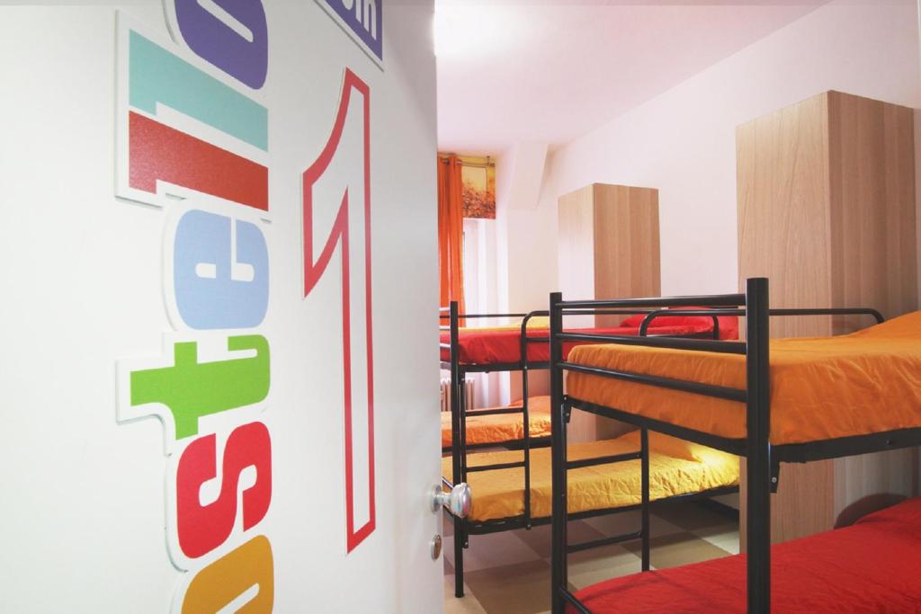 Postel nebo postele na pokoji v ubytování Milano Ostello