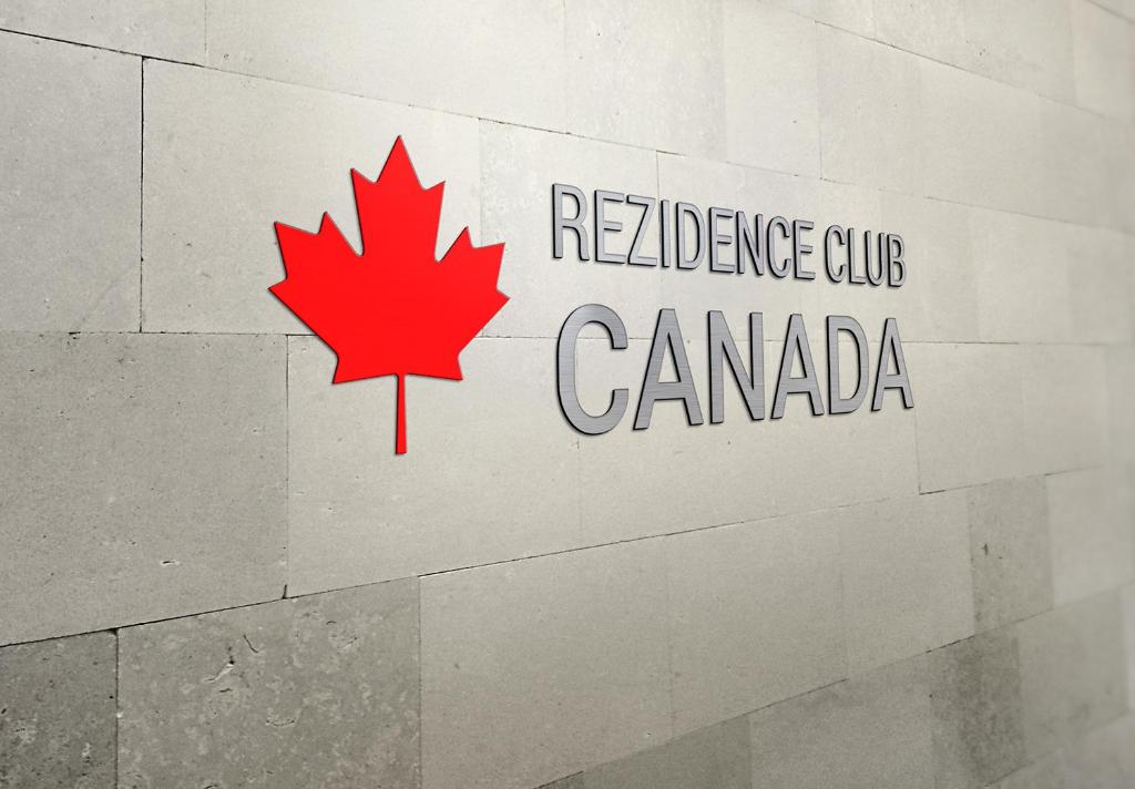a sign for the reserves club canada on a wall at Rezidence Club Canada Appartement XXL conference rooms sauna gril in Lipno nad Vltavou