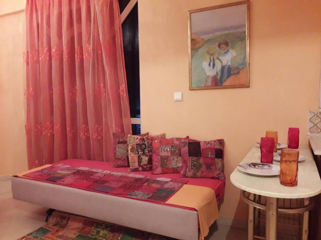Posteľ alebo postele v izbe v ubytovaní Semiramis Apartments