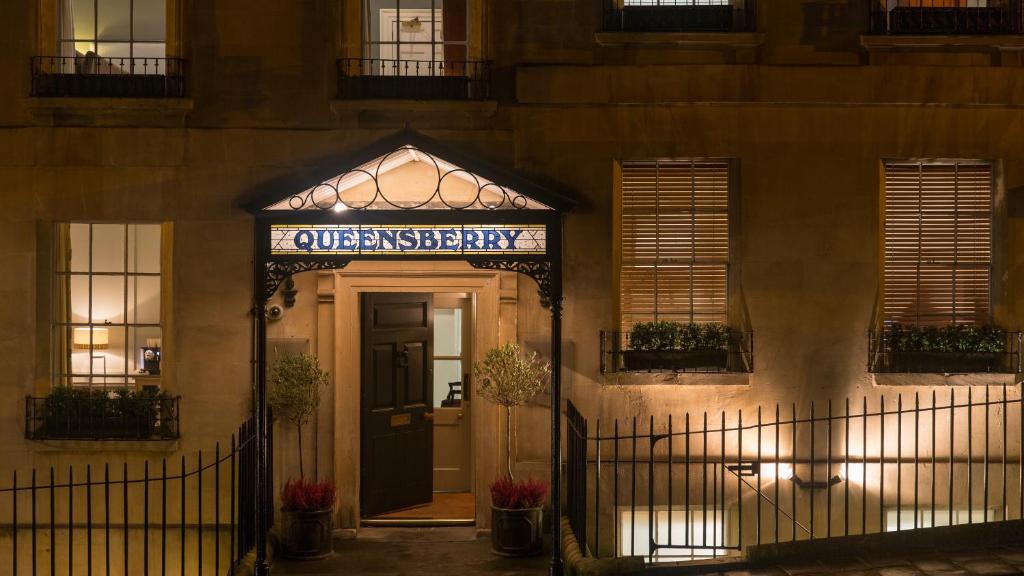 a building with a sign for a university library at The Queensberry Hotel in Bath