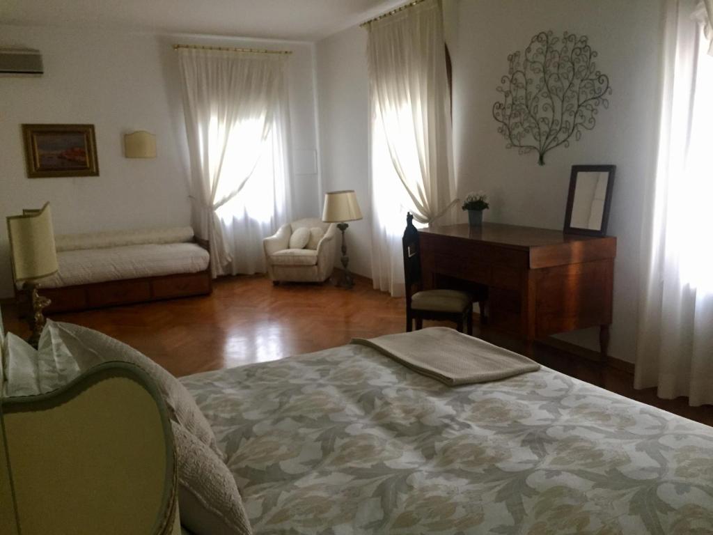 Postel nebo postele na pokoji v ubytování Casa Lunia Guesthouse
