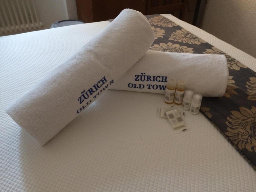 Postel nebo postele na pokoji v ubytování Hotel Old Town