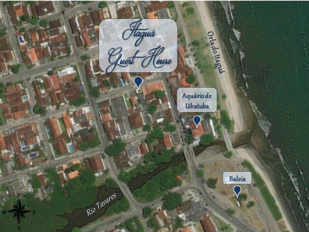 a map of a city with buildings and the words homeowners just love at Itaguá Guest House in Ubatuba