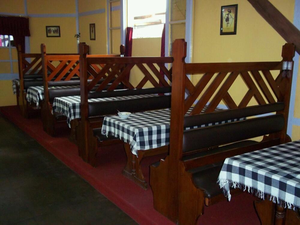 Postel nebo postele na pokoji v ubytování Dieng Kledung Pass Hotel & Restaurant