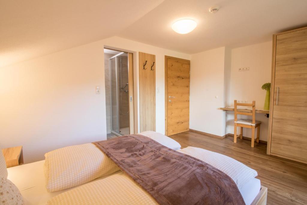 Letto o letti in una camera di Haus Reintal