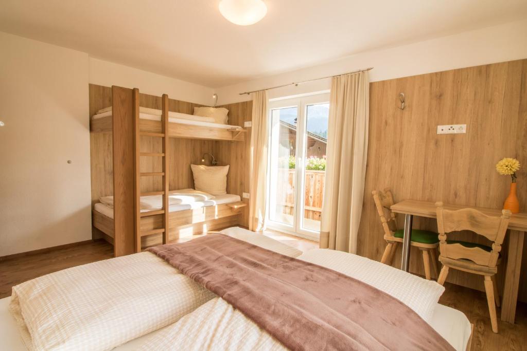 Letto o letti in una camera di Haus Reintal
