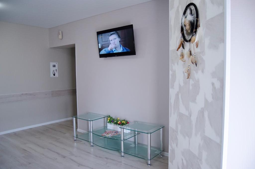 TV a/nebo společenská místnost v ubytování Kolibri