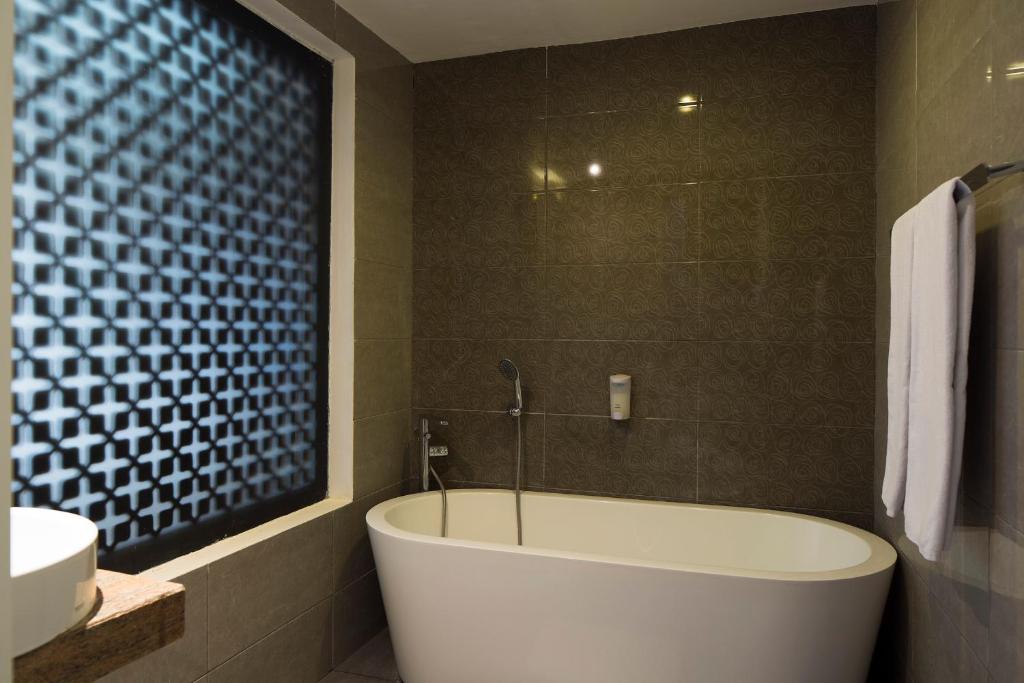 Koupelna v ubytování Natya Hotel Kuta