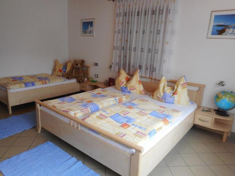 Postel nebo postele na pokoji v ubytování Residence Hofer