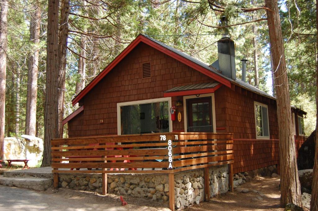 a small cabin in the woods in the woods at 78 Ox Yoke in Wawona