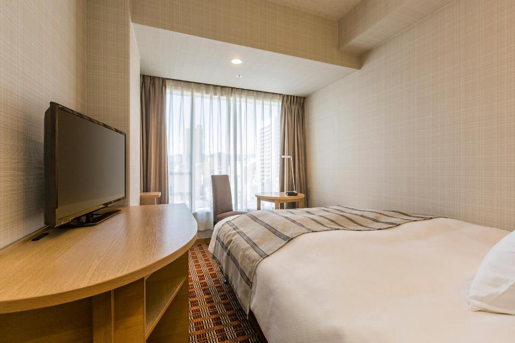 TV a/nebo společenská místnost v ubytování Garden Hotel Shizuoka