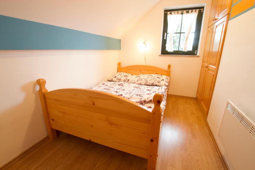Postel nebo postele na pokoji v ubytování Apartment Sara