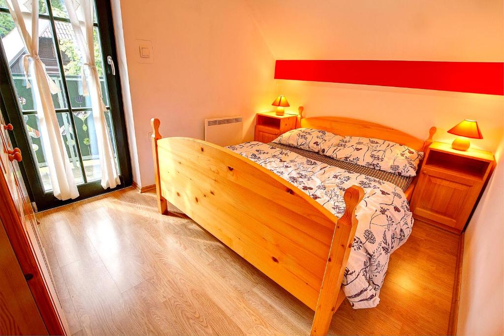 Postel nebo postele na pokoji v ubytování Apartment Sara