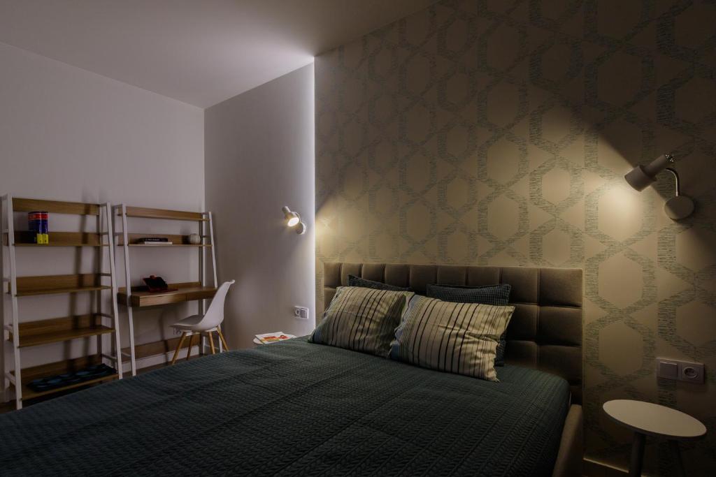 Postel nebo postele na pokoji v ubytování Apartamenty City View od WroclawApartament-pl