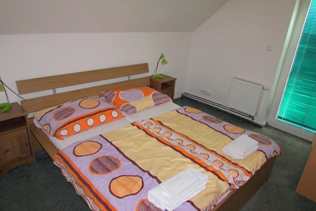 Łóżko lub łóżka w pokoju w obiekcie Villa Vranov 55