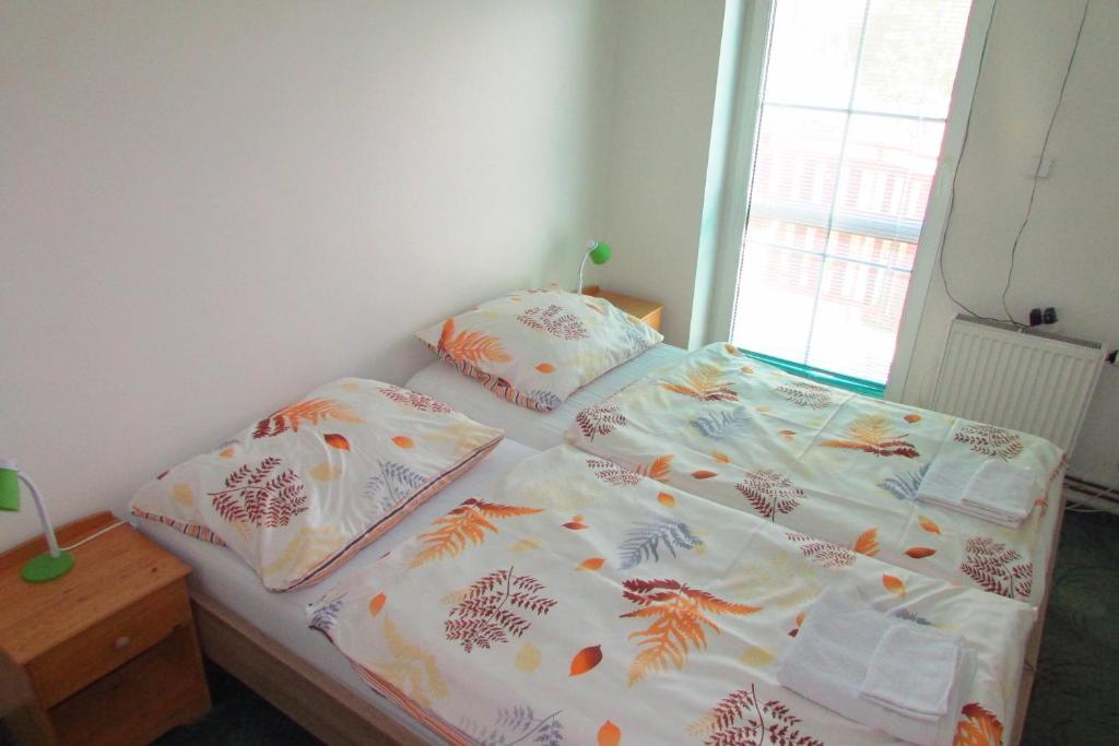Łóżko lub łóżka w pokoju w obiekcie Villa Vranov 55