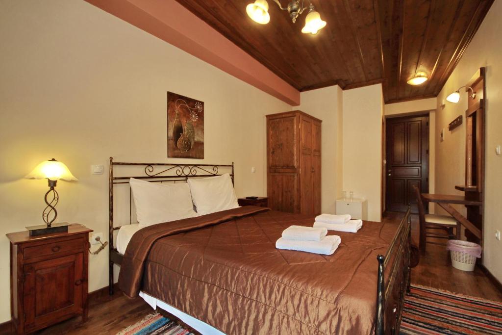 Letto o letti in una camera di Thea Valtessinikou