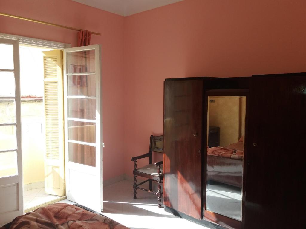 Letto o letti in una camera di Hotel Le Gardenia (ex Lutetia)
