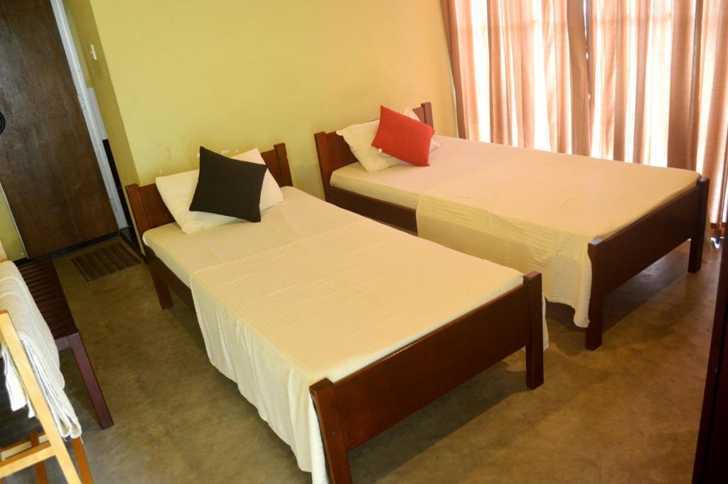 Postel nebo postele na pokoji v ubytování One C Hostel