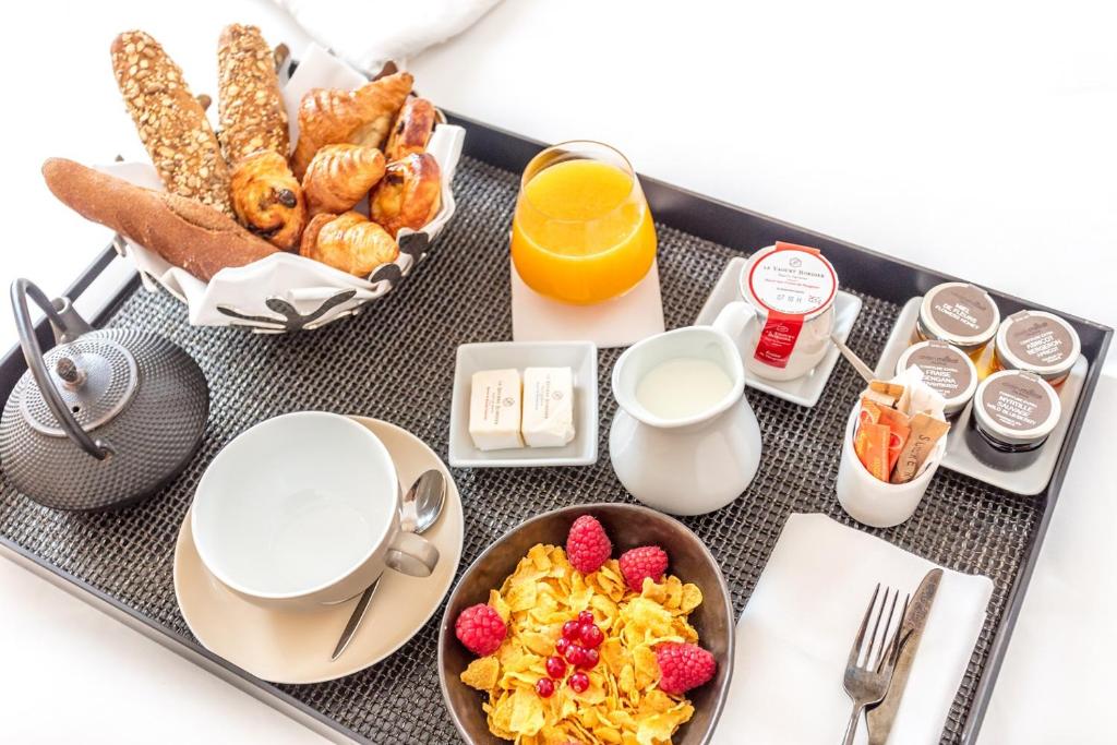 
Breakfast options available to guests at Hotel Marignan Champs-Elysées
