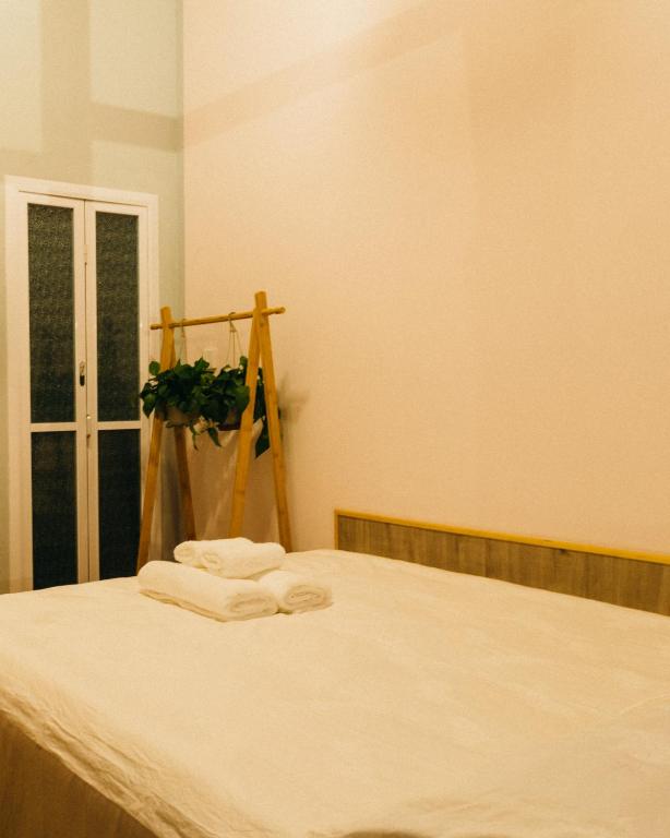 Postel nebo postele na pokoji v ubytování Chez Ina & Jasee