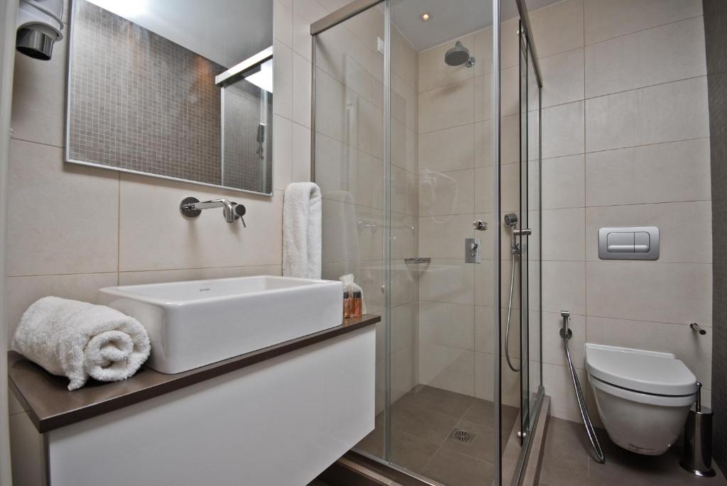 Koupelna v ubytování Xenia Hotel