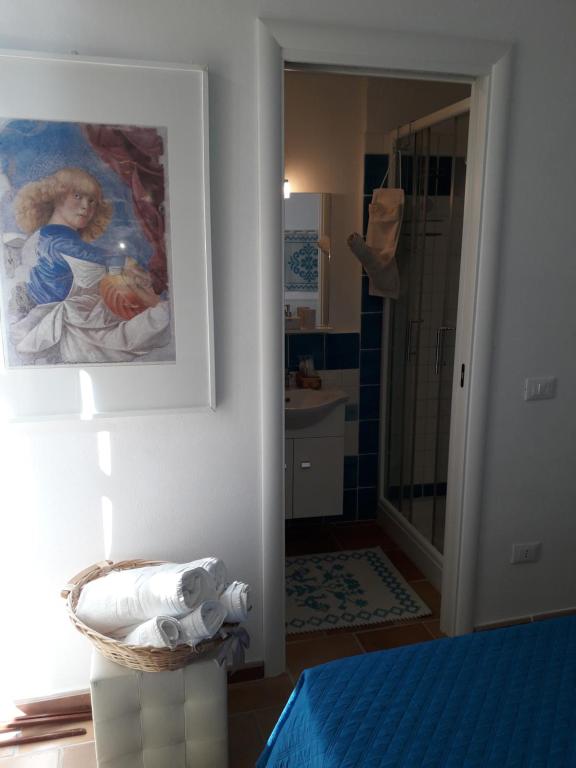 Postel nebo postele na pokoji v ubytování B&B Il Porticciolo Portoscuso